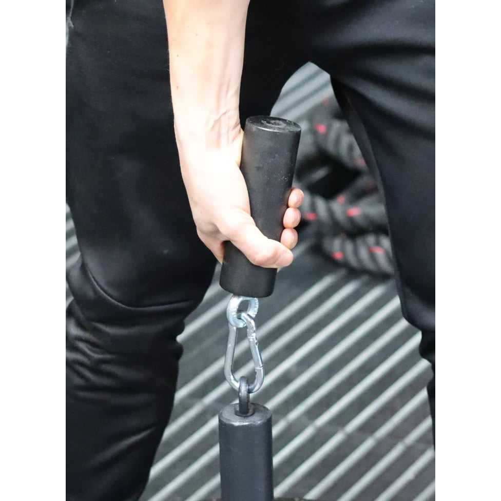 Golden Grip Cylinder Grip for strength training, available in two sizes: standard (16cm long, 5cm diameter) and fat (16cm long, 7cm diameter), made from cold hard steel with a grippy powder-coated finish, designed to enhance crushing grip strength.