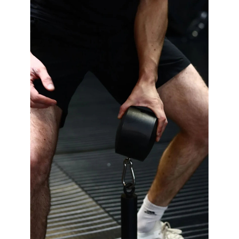 Loadable Blob grip training tool, 10cm wide and 14cm diameter, 1.6kg, designed for building pinch grip strength with adjustable loading pin compatibility.