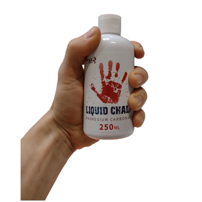 liquid chalk bottle from Max Climbing holding in hand